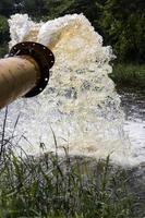 Water outflow pipe vigorously. photo