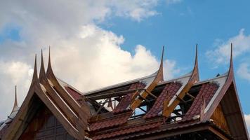 Thai roof scaffolding sky cloud. photo