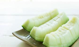 Juicy slice melon on plate