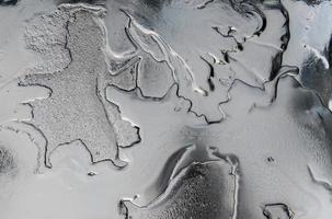 textura de la superficie del petróleo crudo foto