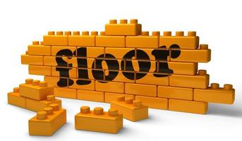 floor word on yellow brick wall photo