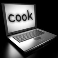 cocinar palabra en la computadora portátil foto