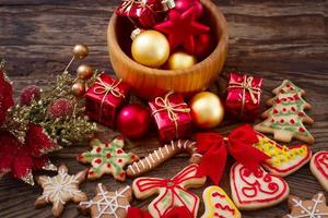 Christmas cookies on brown wooden table. Top view and mock up. photo