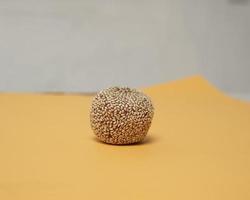 Popular Indonesian snacks that are loved by all groups from children to even adults. Onde-Onde is a typical Indonesian food made from glutinous rice flour with peanut paste, wrapped in sesame seeds. photo