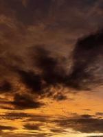 very beautiful twilight sky, a blend of orange and blue colors. beautiful view of the evening sky. clouds, sky and rainbow that adorn the atmosphere in the afternoon. Evening view in Jakarta. blur photo