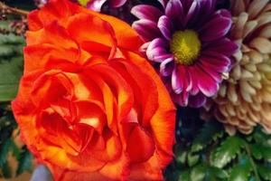 Assortment of bright flowers in an arrangement. photo