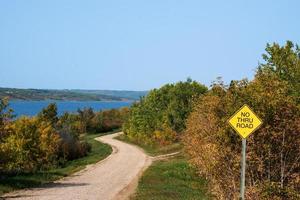 Back country road on the Canadian prairies in fall. photo