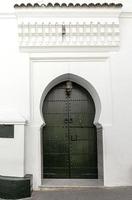 Arabic architecture in the old medina. Streets, doors, windows, details photo