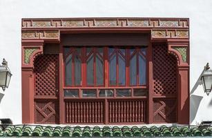 Arabic architecture in the old medina. Streets, doors, windows, details photo