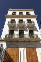 Arabic architecture in the old medina. Streets, doors, windows, details photo