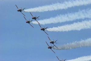 squadron of planes at an air show photo