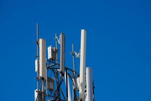 Telecommunication tower of 4G and 5G cellular. Antenna transmission communication. Cell phone signal base station. photo