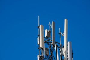 Telecommunication tower of 4G and 5G cellular. Antenna transmission communication. Cell phone signal base station. photo