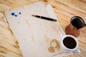 Background of a cup of coffee on an old paper photo