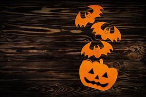 Halloween background with bats, pumpkins. Halloween holiday background. photo