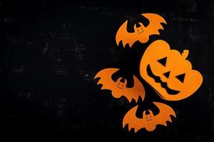 Halloween background with bats, pumpkins. Halloween holiday background. photo