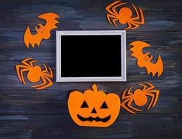 Halloween background with spider, bats, pumpkins. Halloween holiday background. photo