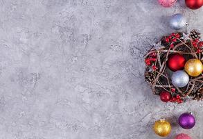 Christmas background. Christmas toys and decorations on wooden background. Top view photo