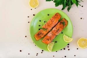 Baked salmon with spices. Top view photo
