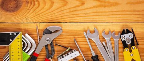 Banner with working tools on wooden rustic background. Top view. Banner. Copy space photo