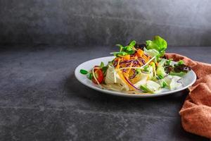 Vegetable salad healthy vegetarian food on a plate photo