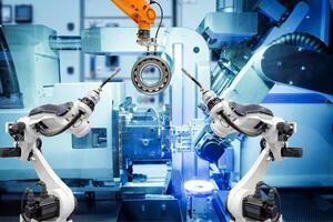 robot de soldadura industrial y robot de agarre que trabaja con piezas metálicas en una fábrica inteligente foto