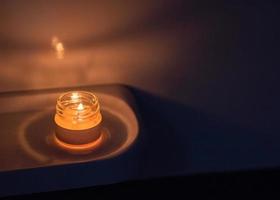 lighted candles in the bathroom photo