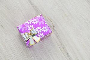 Pink gift box with silver bow. photo