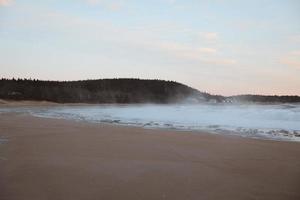 Fog coming off the water photo