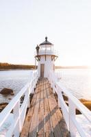 Lighthouse in sunlight photo