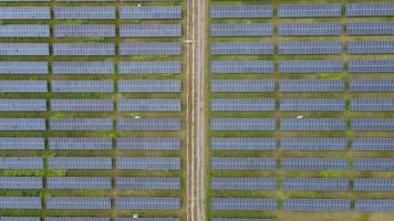 Top view,Aerial top view of solar power station with large amount of solar panel cells. Concept of future technology,renewable sun energy, cell power plants. video