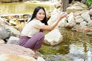 Asian woman tourists smile happily. photo