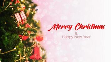 Merry Christmas and Happy New Year with Christmas tree background. photo