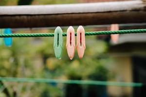 Cloth clip, Clothespins on a clothesline rope photo