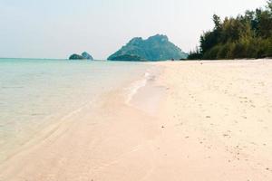 beach on a tropical island in the afternoon photo