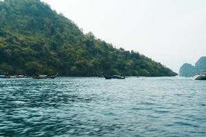 rocky mountain island in the sea photo