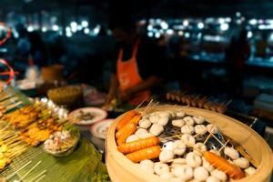 Food at a street market in the evening in Krabi photo