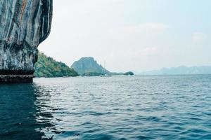 rocky mountain island in the sea photo