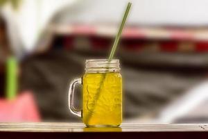 A soft drink on a nature background photo