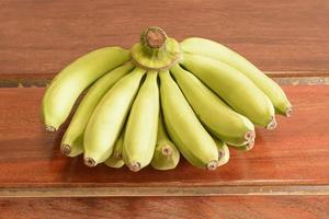 The banana on a wood background. photo