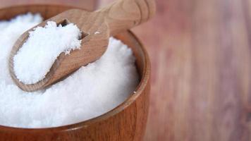 Coarse salt in a bowl on table video