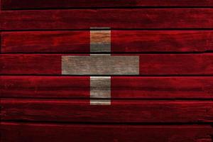 Flag of Switzerland on wood photo