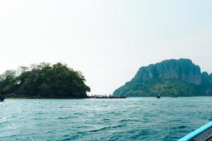 rocky mountain island in the sea photo