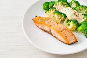 grilled salmon fillet steak with broccoli photo