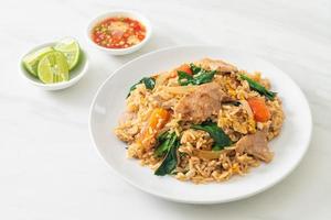 Fried rice with pork on plate photo