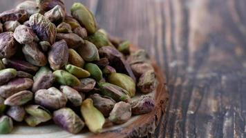 detail shot of natural pistachios nut on in bowl video