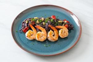 stir-fried black spaghetti with garlic and shrimps photo