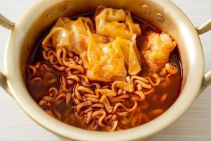 Korean instant noodles with dumplings photo