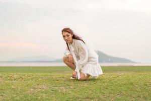 Happy young Asian women in bride clothing with veil photo