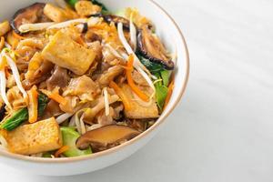 stir-fried noodles with tofu and vegetables photo